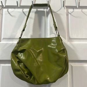 Awesome green vintage bag with braided strap. Excellent condition.